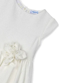 Abito cerimonia con fiore e retro in tulle ricamato neonata ecru