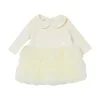Abito con fondo in tulle burro