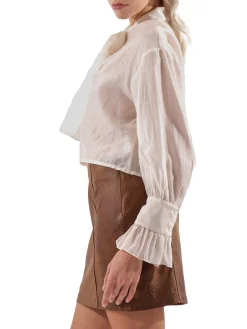Blusa con fiocco e maniche a sbuffo burro