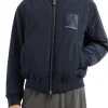 Bomber con zip patch logo blu