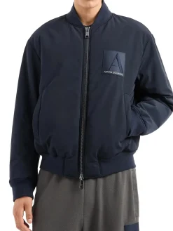Bomber con zip patch logo blu