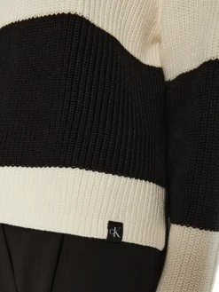 Dolcevita a costine con logo avorio/nero