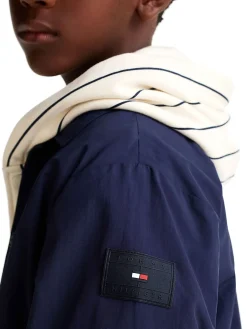 Giacca coach con logo ricamato sul petto blu