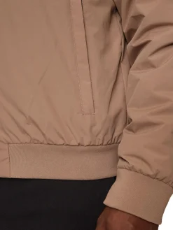 Giubbino con cappuccio e dettagli a contrasto beige/nero