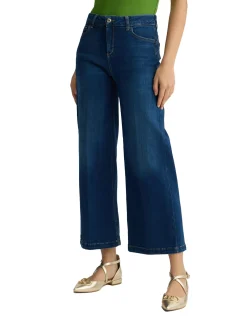 Jeans a gamba flare con inserto elastico sul dietro denim medio