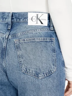 Jeans slim a vita alta in denim chiaro