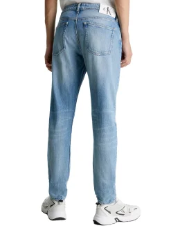 Jeans slim taper denim medio