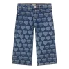 Jeans stampa allover in denim medio