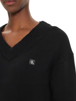 Maglione con scollo a v e logo sul petto nero