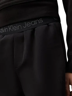 Pantalone cargo teen con elastico in vita logato nero