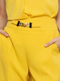 Pantalone elegante con catena giallo