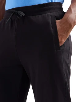 Pantalone jogger tape logo bianco laterale nero