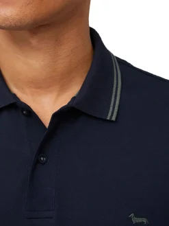 Polo blu con collo rigato