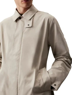 Trench con design minimalista beige chiaro
