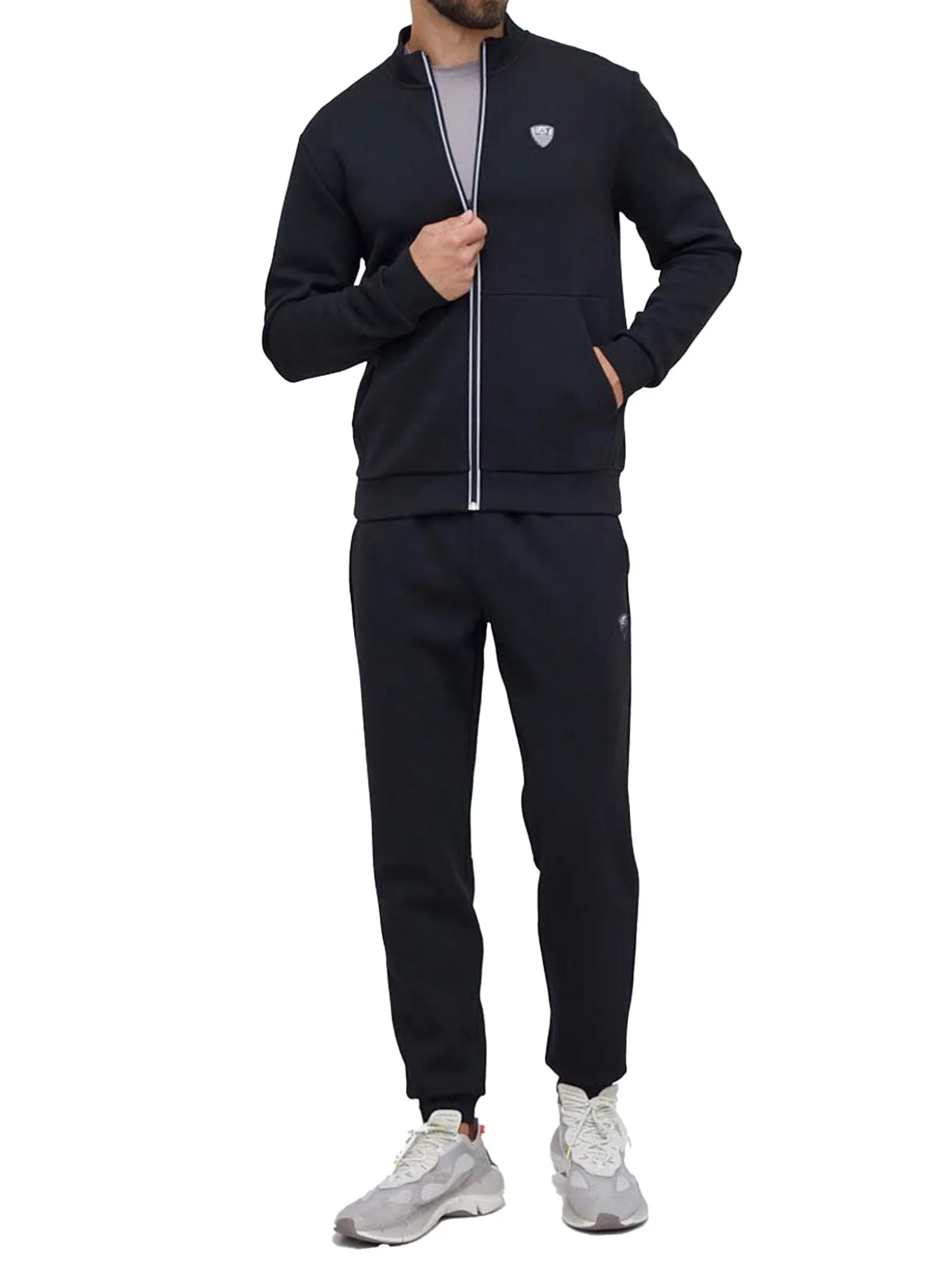 Tuta con zip e placca logo nero