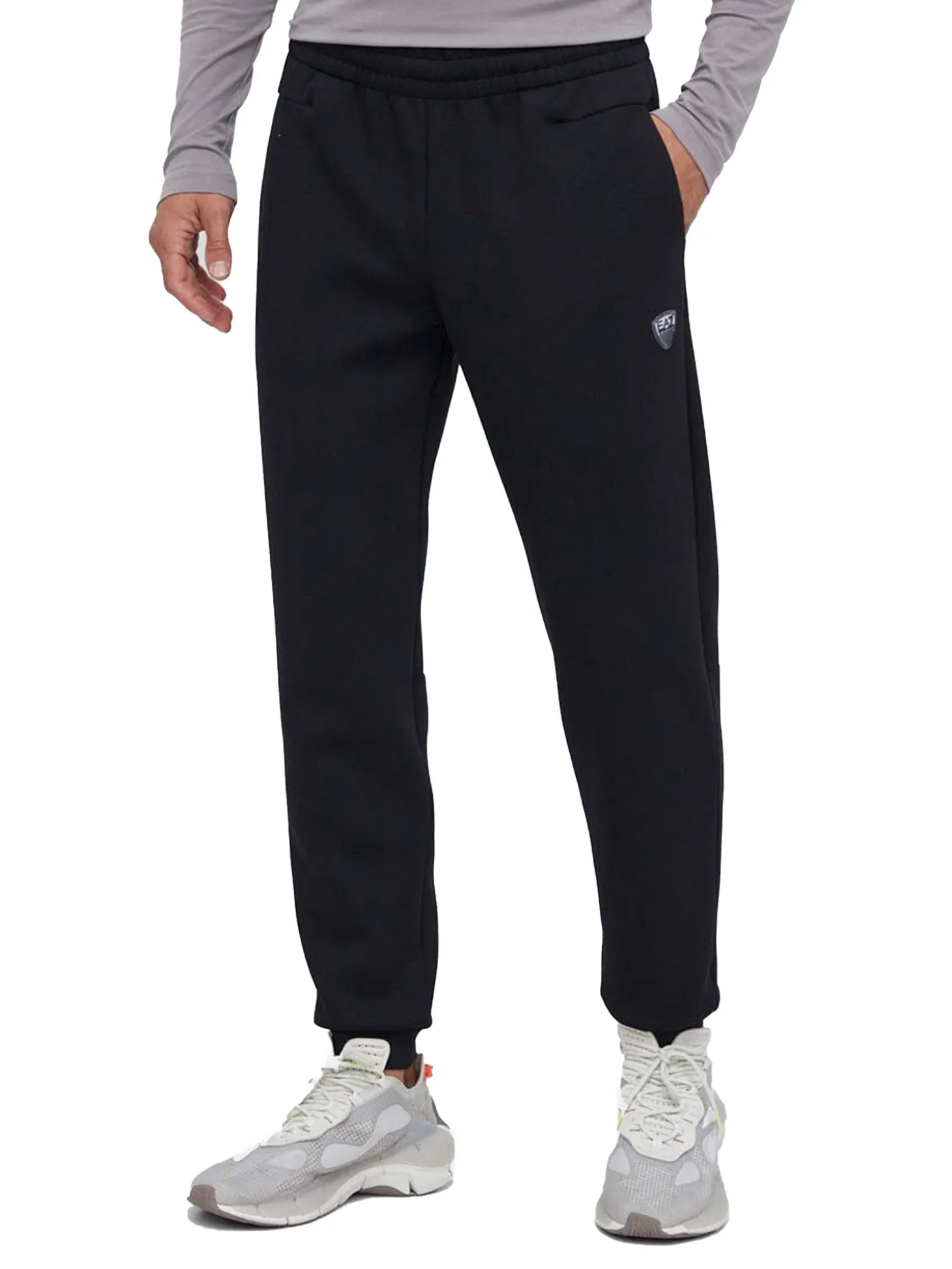 Tuta con zip e placca logo nero