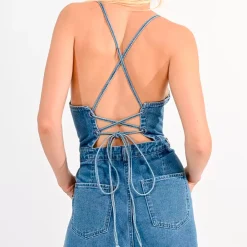 Tuta in denim con lacci sul retro